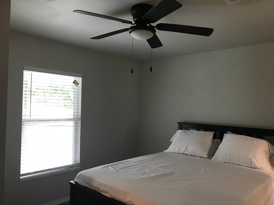 queen sized bed, back room.
