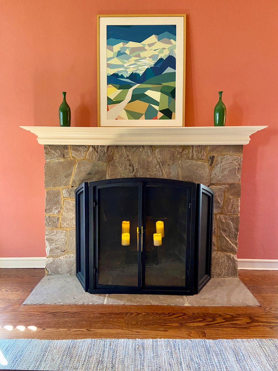 Decorative fireplace with battery operated faux candles.