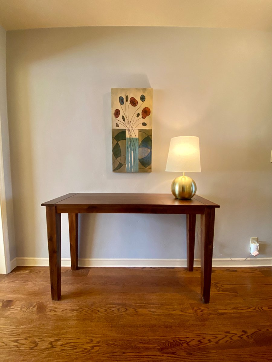 Wide hallways, console table with light, carbon monoxide detector.