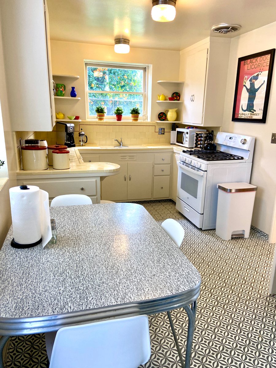 Eat-in kitchen with retro table and seating.