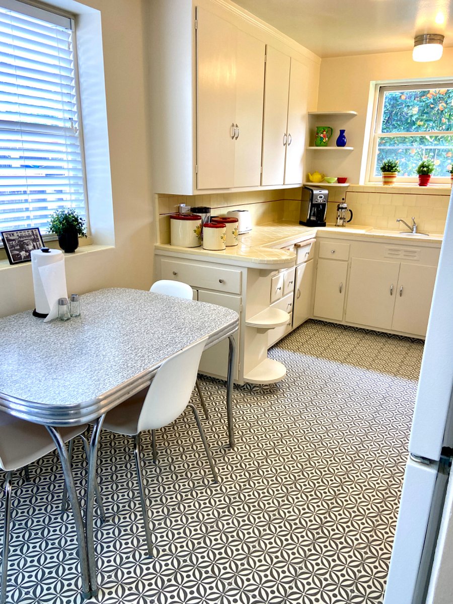 Eat-in kitchen with retro table and seating.