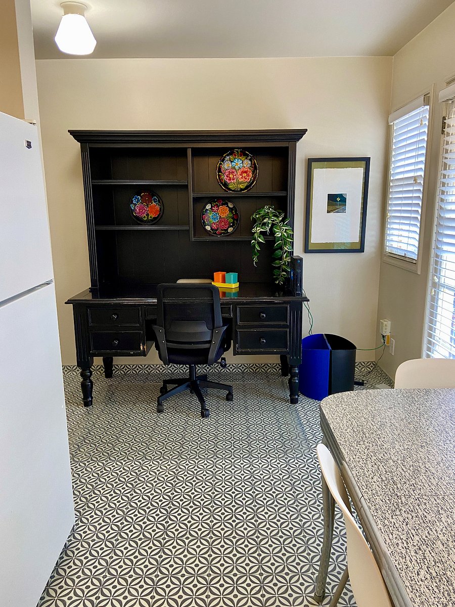 Large desk in the workspace off the kitchen with gigabit fiber internet access.