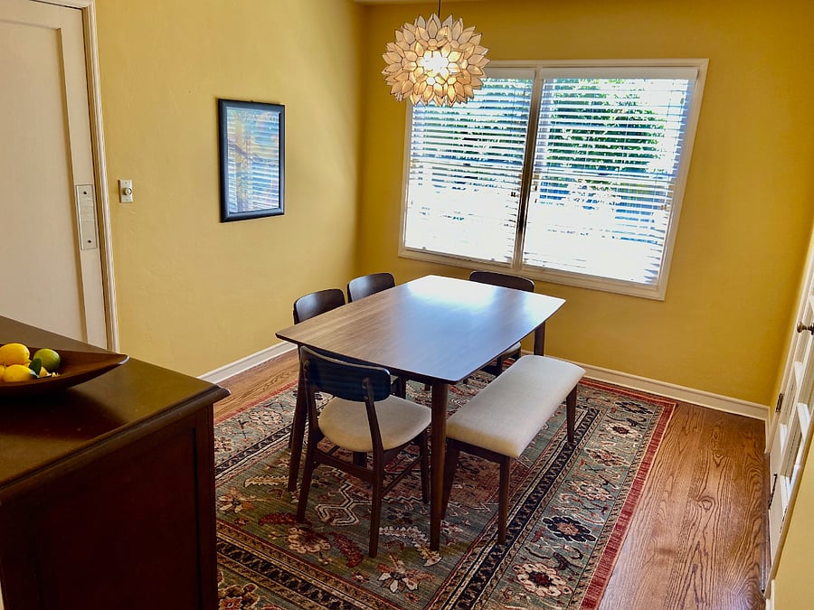 Dining room with large window to back yard.