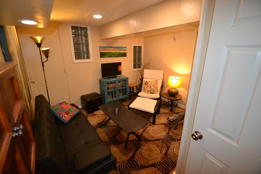 Basement apartment has own private large bathroom/shower and private sitting room/office.  Currently rented  by a quiet young male UC Law student. It is a shared kitchen with this renter. He is tenting longterm so basement will not ve available. 