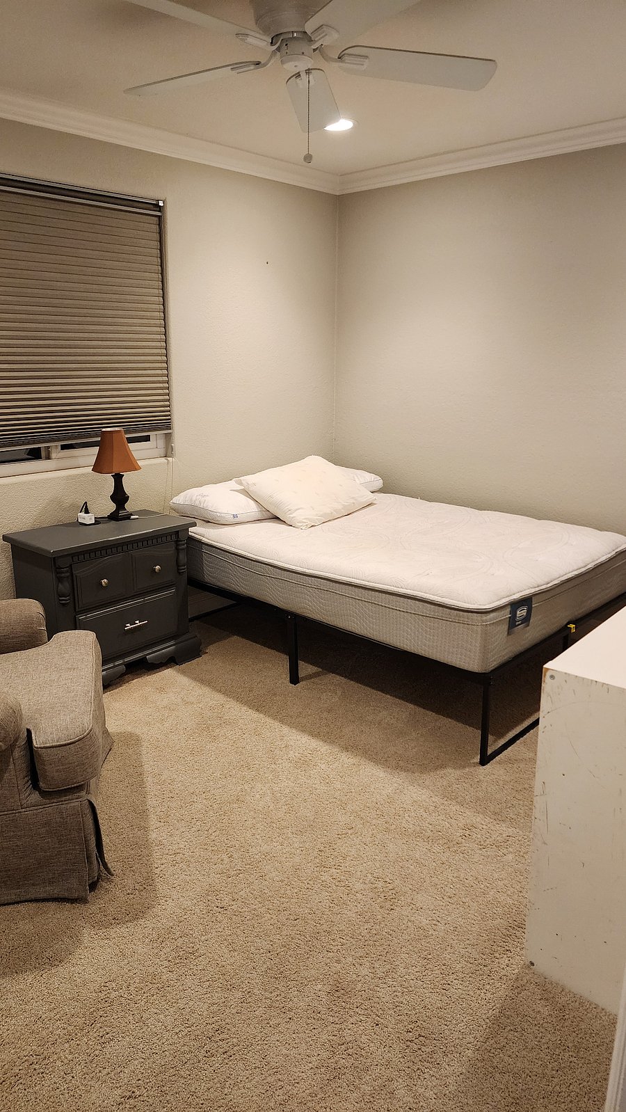 Bedroom #1 - Full Size Bed, Nightstand, Oversized Chair, and closet