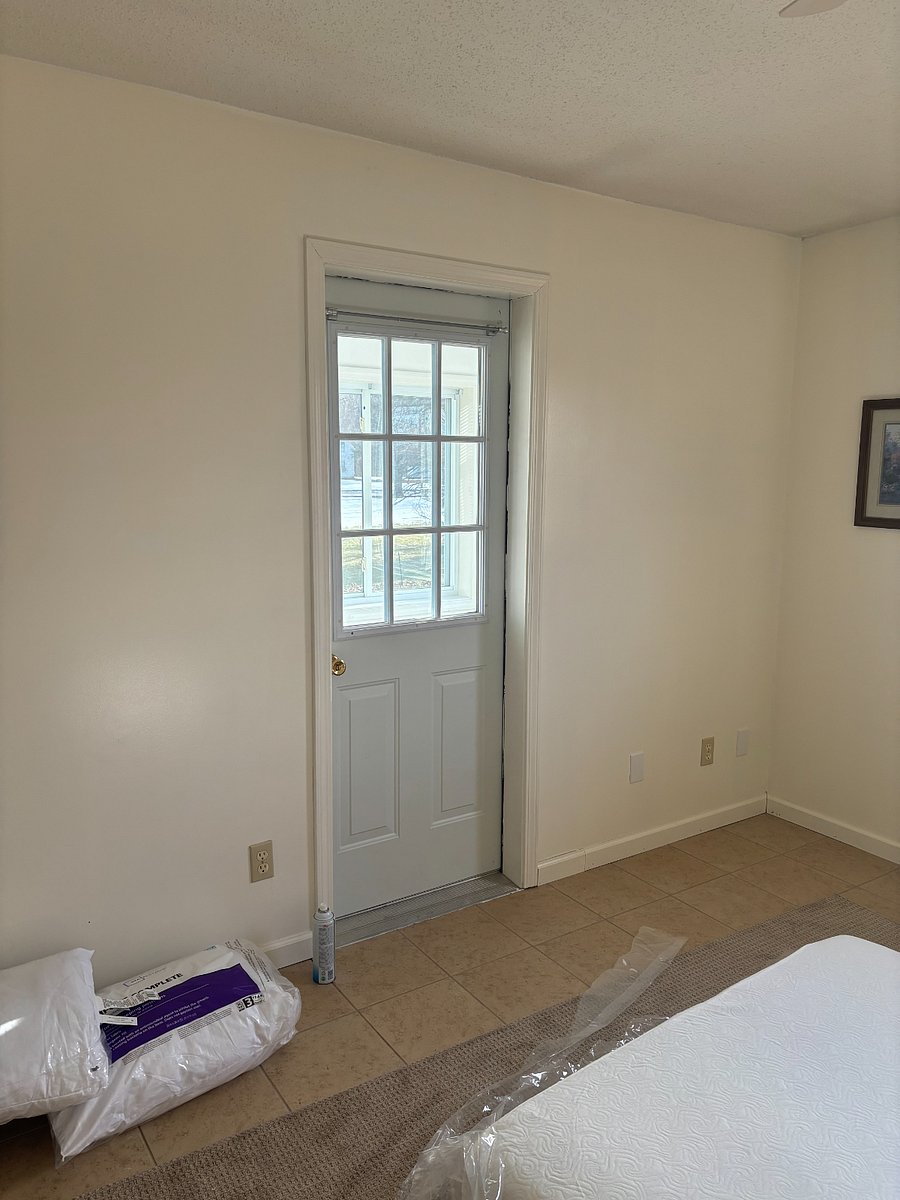 door to 3 season porch off bedroom