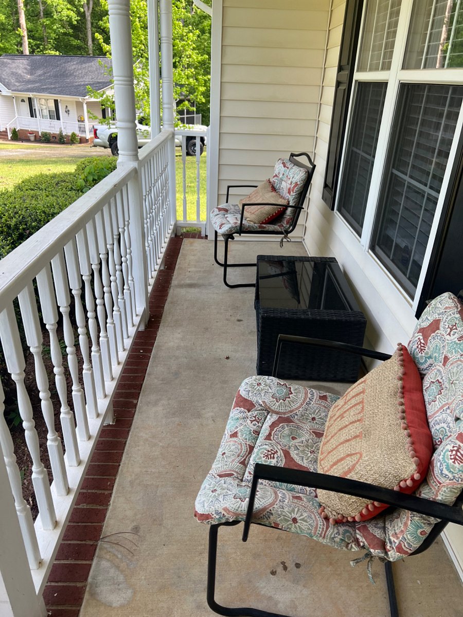 Front porch seating with outdoor coffee table