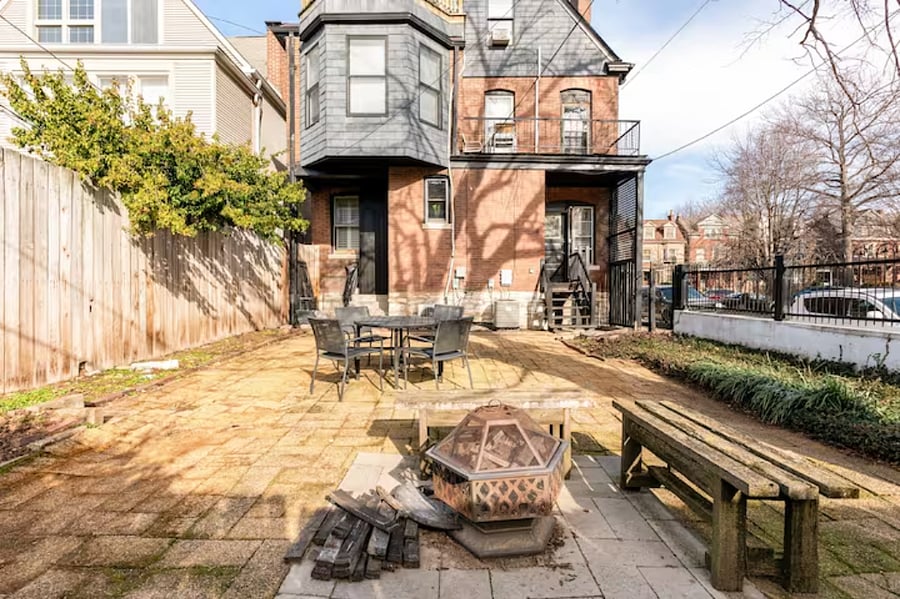 Patio for dining and firepit shared with one other apartment