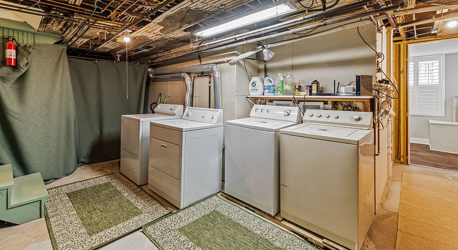 Laundry room shared with one other apartment