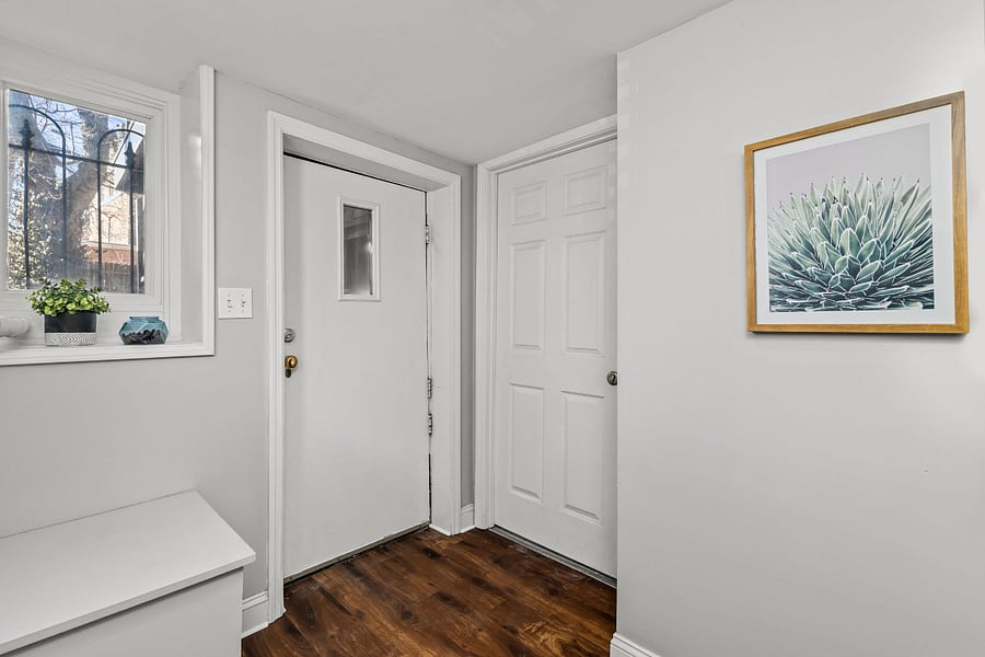 Entry hall leads to laundry room