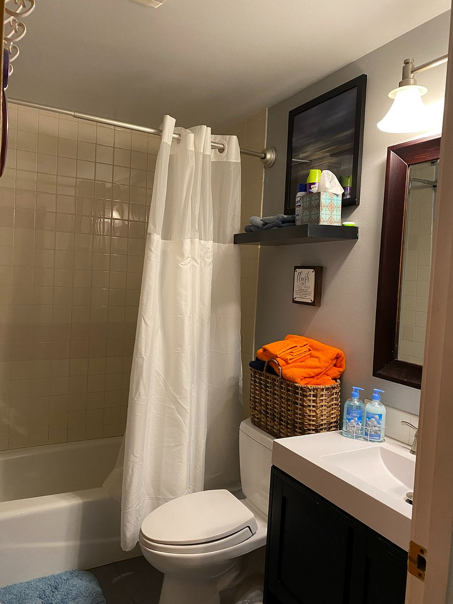 Bathroom single sink, tub, shower and Towels provided