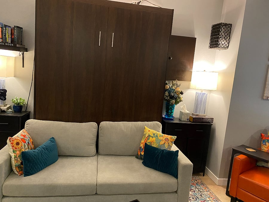 Couch in front of Queen Murphy Bed