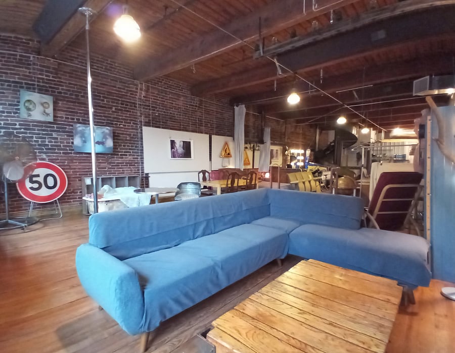 This viewpoint emphasizes once again the expansive and open layout that defines the loft's spaciousness.
