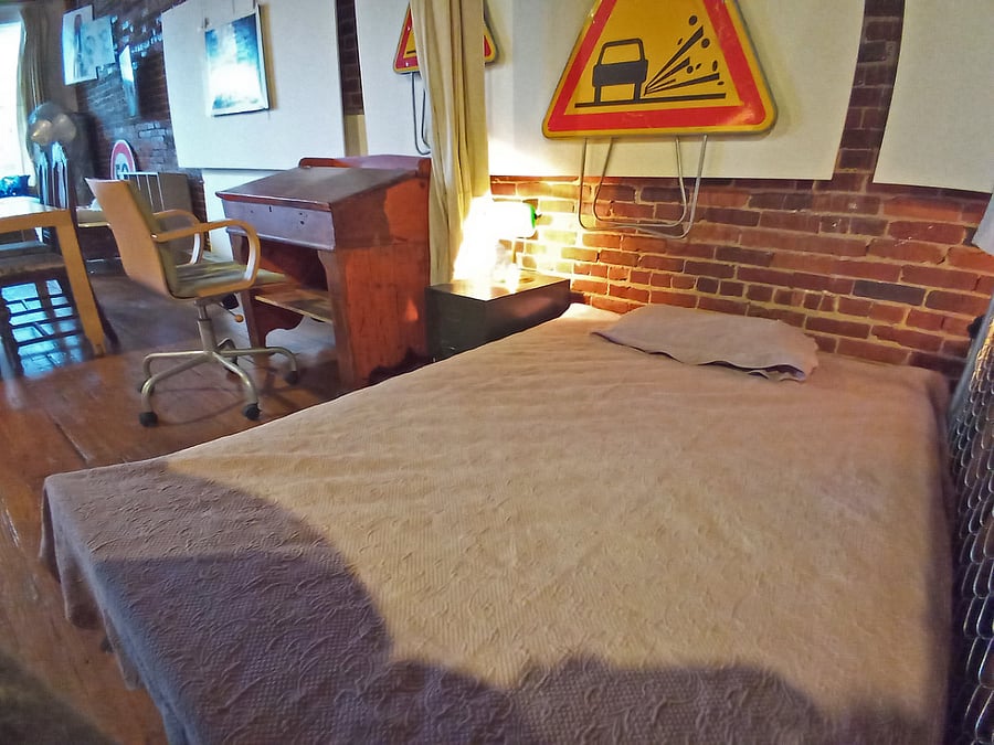 A view of the guest bedroom featuring a comfortable double bed.