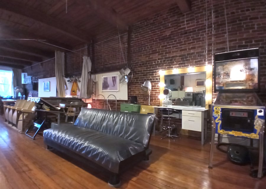 An alternate perspective of this versatile workspace alongside additional seating.