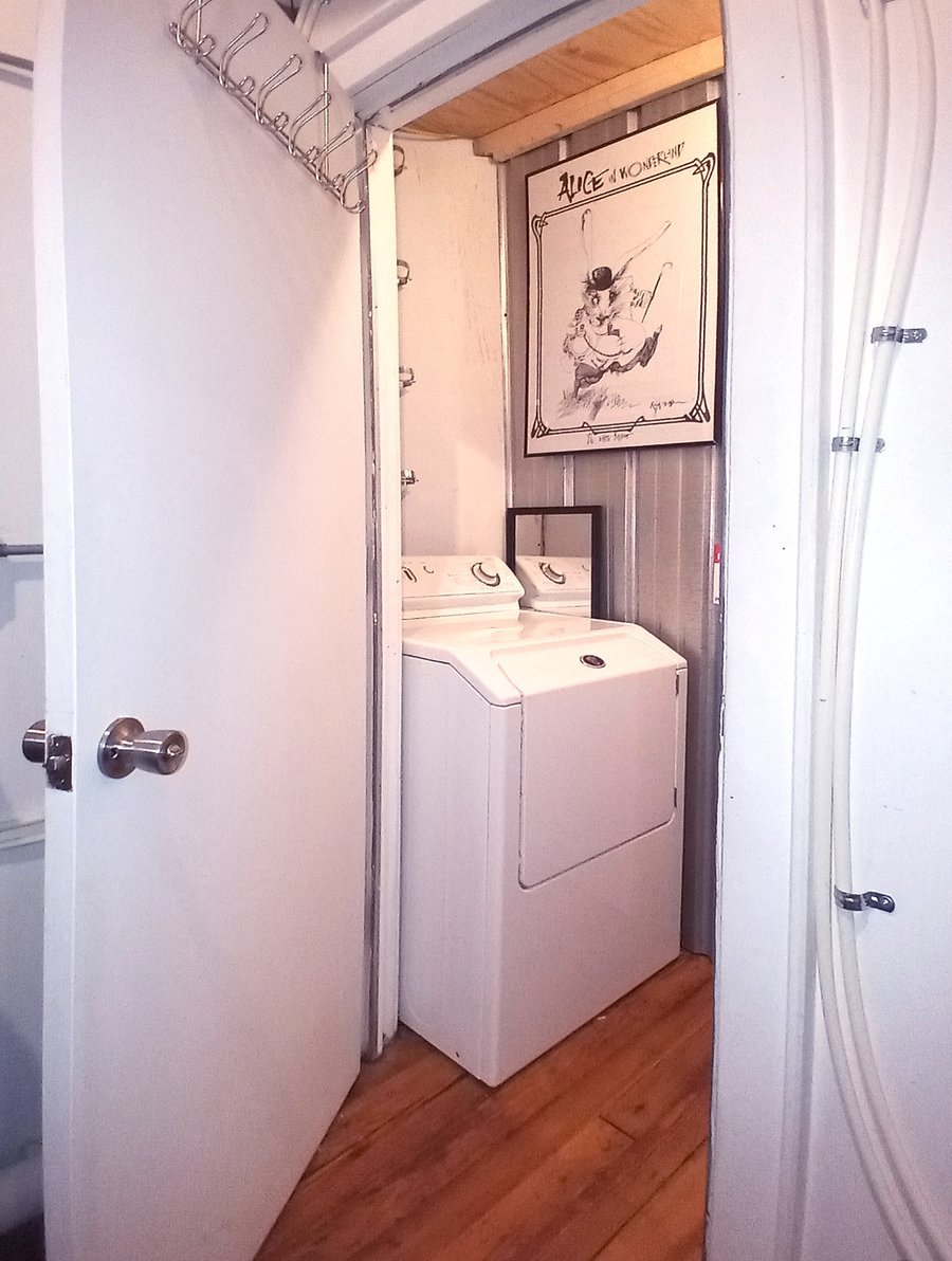 No home is truly complete without an industrial-sized washer and dryer, ensuring convenience and efficiency in your laundry needs.