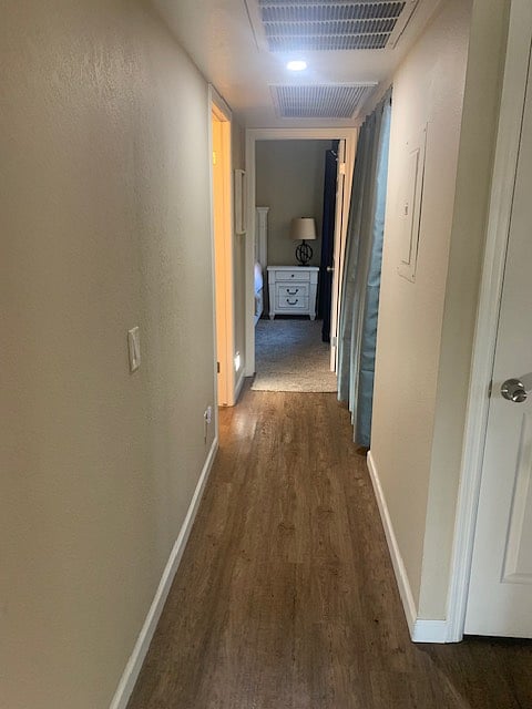 hallway to 2nd bedroom/bath and laundry
