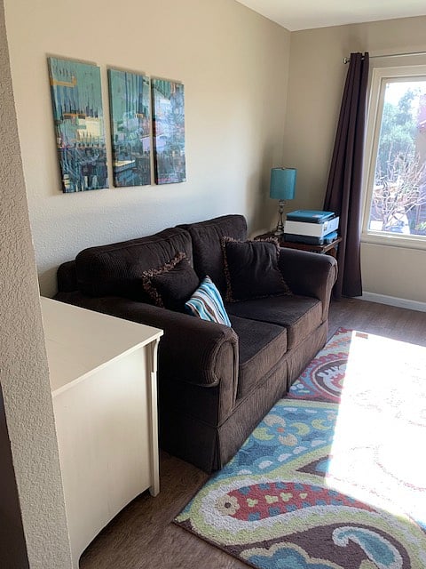 loveseat and printer in office