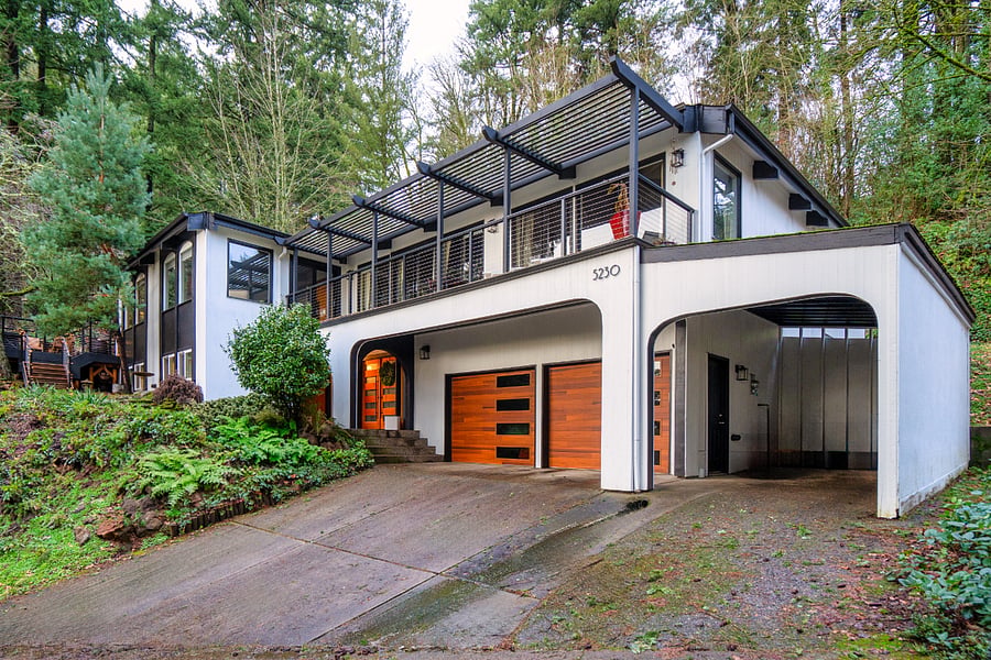 The house. Apartment is strait ahead at entryway. Carport is covered for your vehicle if you have one.