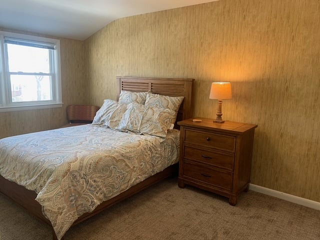 Mid-size bedroom. Full Bed. Newly Carpeted.