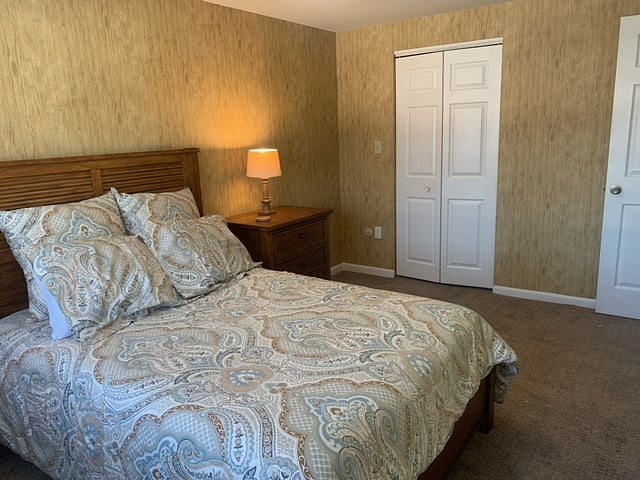 Mid-size bedroom. Full Bed. Newly Carpeted.