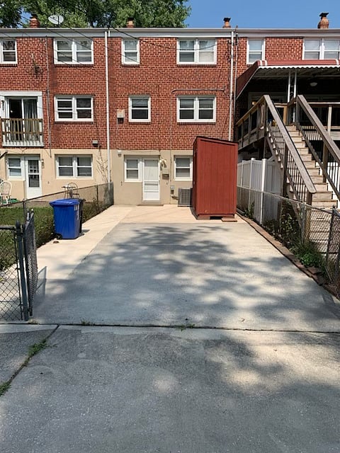 Private parking pad in rear.
