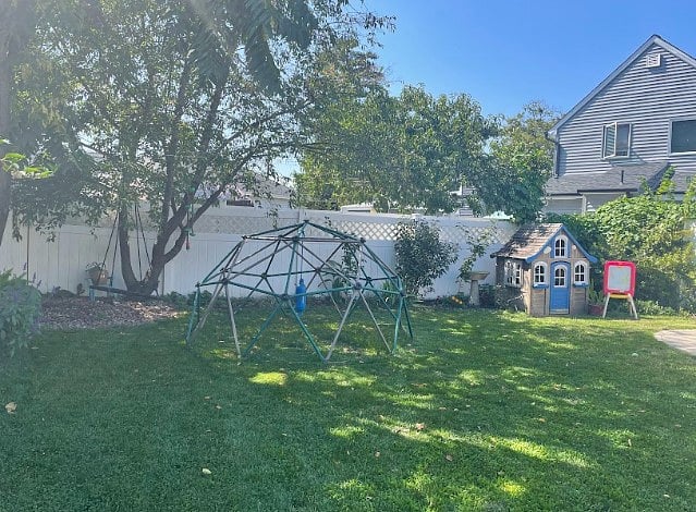 large yard with gardens
