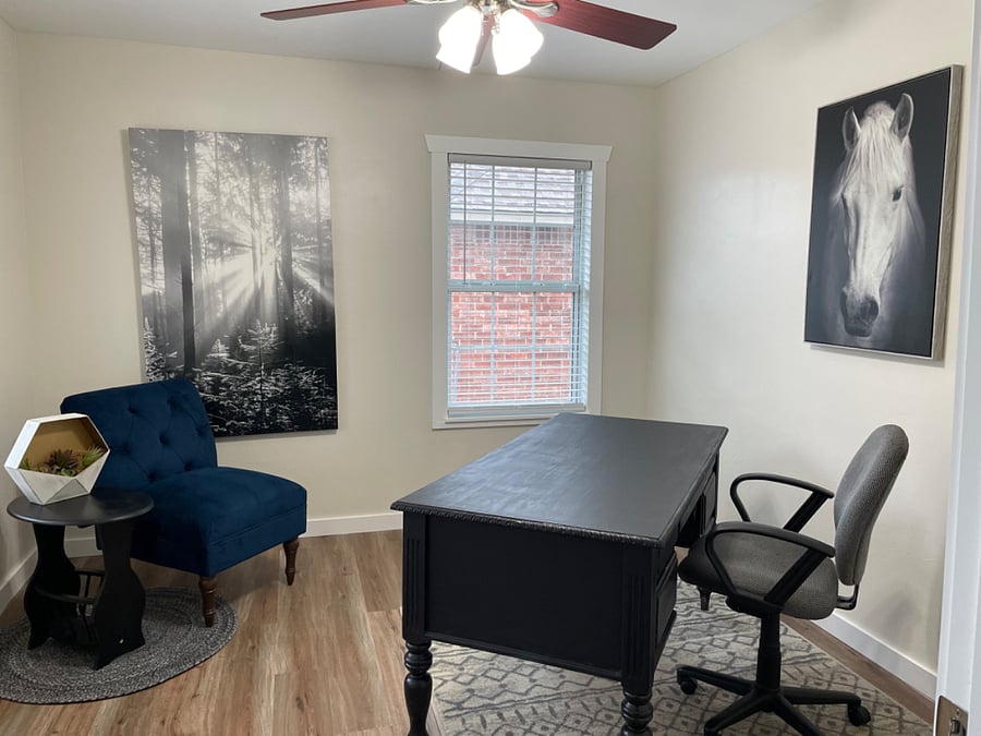 Office located just off the living room. 