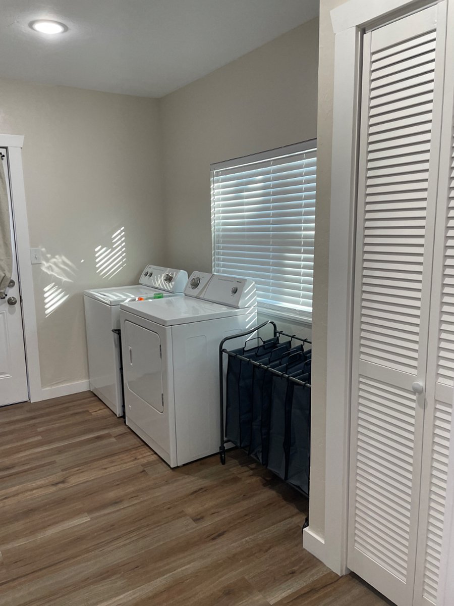 Washer and dryer in unit. 