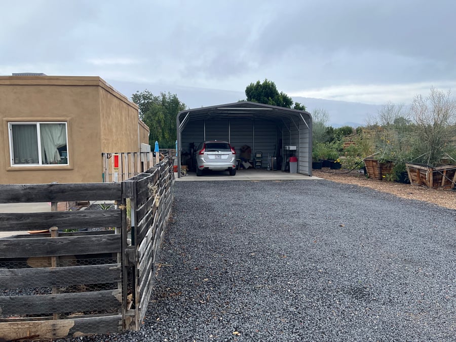 carport with one space available, more parking also available