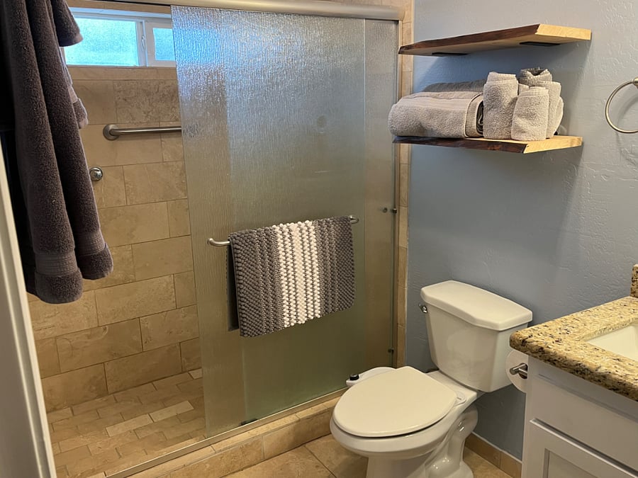 bathroom large shower with rain shower head