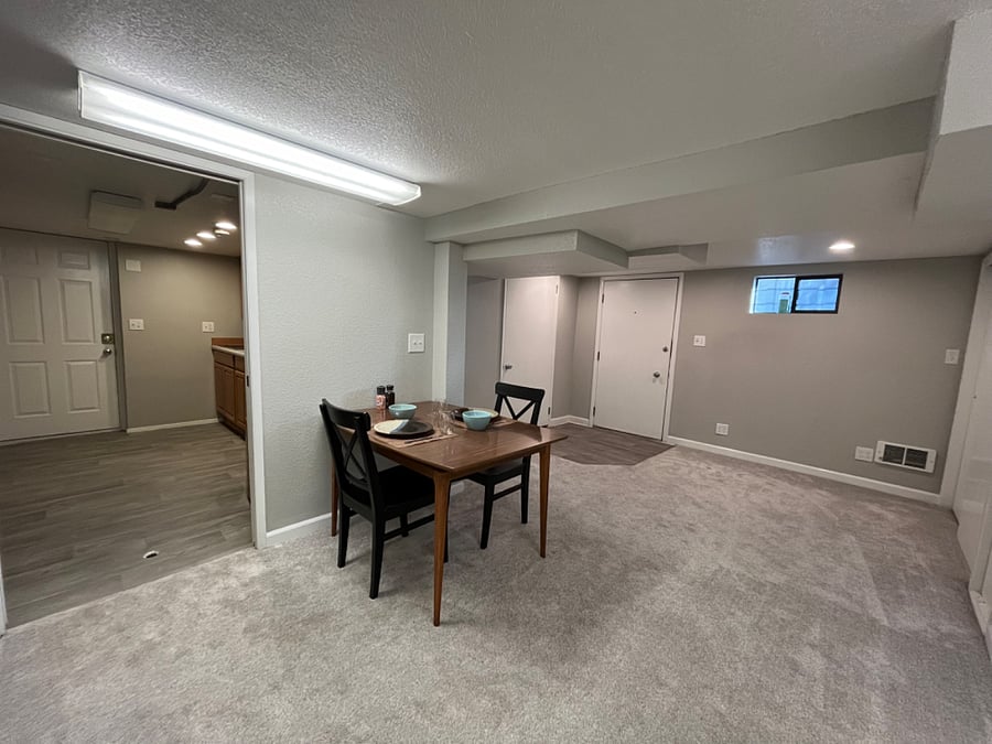 Dining area includes dining table, and 2 chairs.