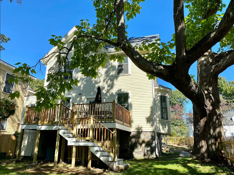 Side porch and large fully fenced in yard