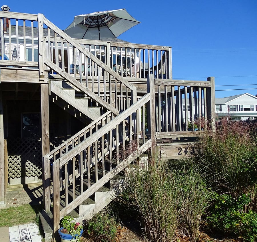 Stairs to deck and living room.