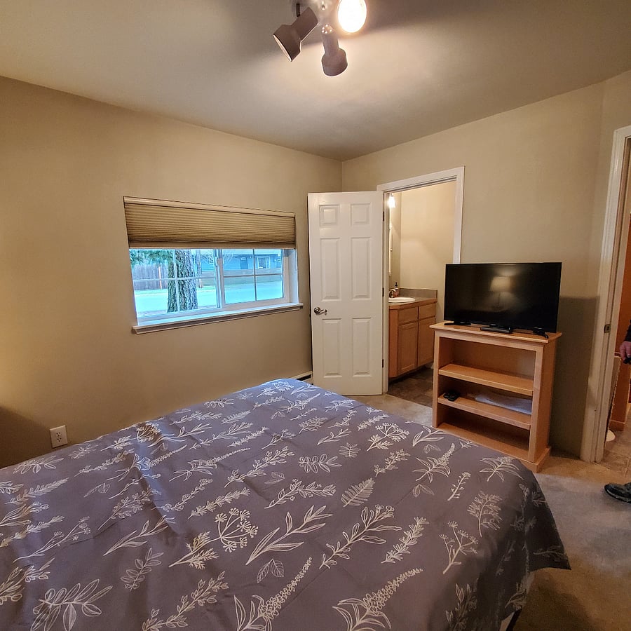 TV and door to Half Bath