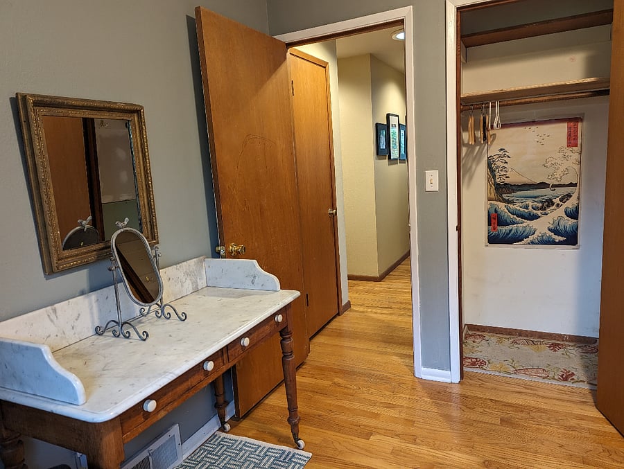 A view out to the hallway from your room. Your closet is on the right, and we have extra space in the hallway closets.