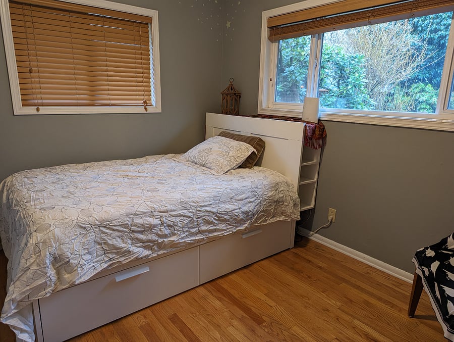 The bedroom for rent, from the entry door looking SE. This is a full bed, with a nice mattress.