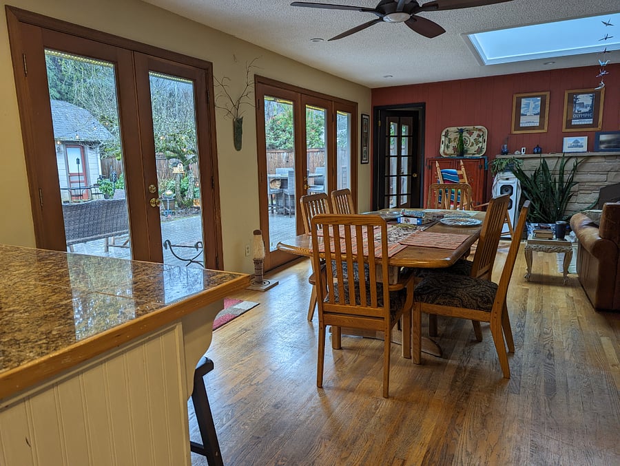 Shared dining room with view of deck and fire table