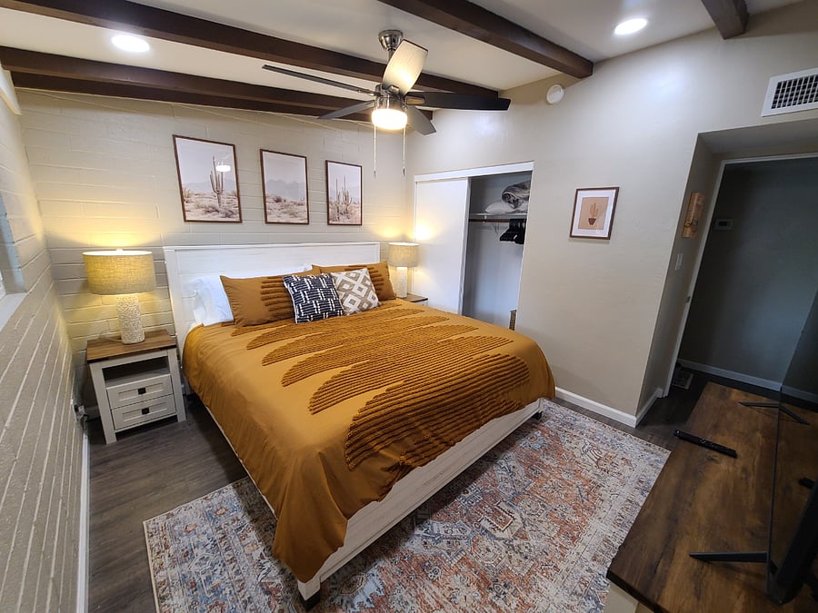 Dual nightstands, a full-sized closet, and a large dresser allow for ample storage in the bedroom. A 55" Smart TV is provided for your entertainment.
