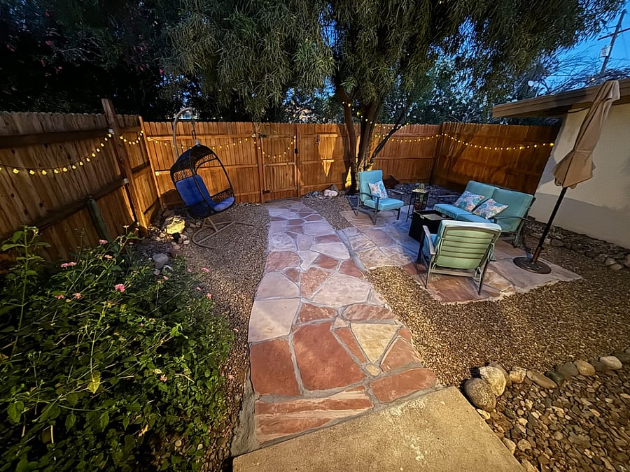 Solar lights provide lighting and ambiance to the backyard at night.