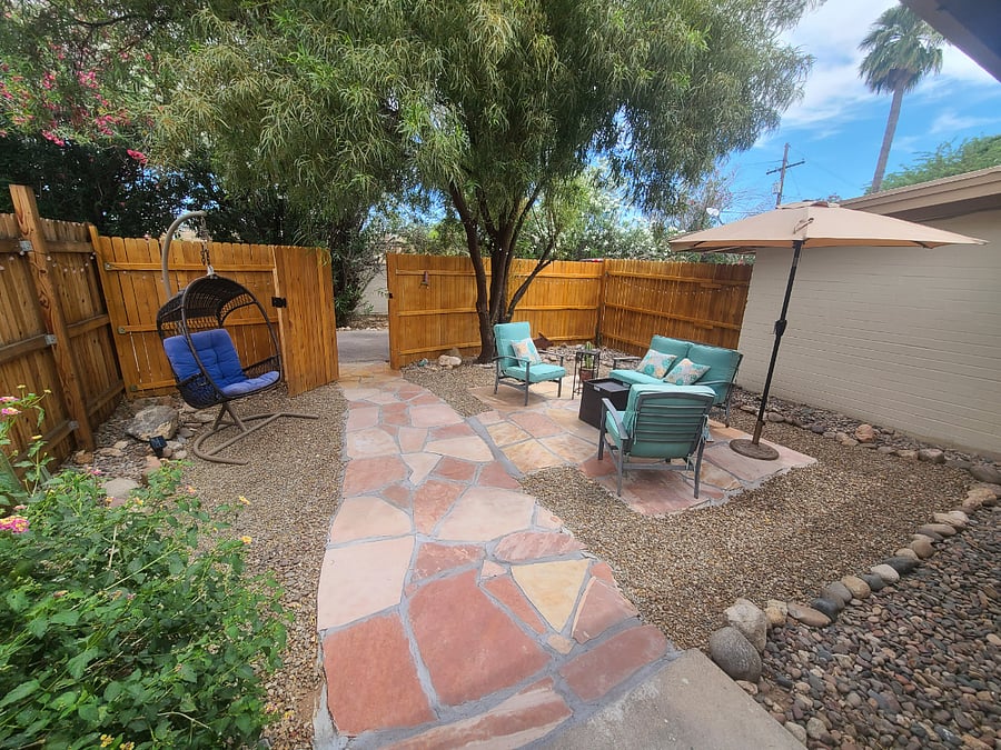 Spring 2024 updates- we installed a higher fence in the rear yard for added privacy. New flagstone patio as well. 