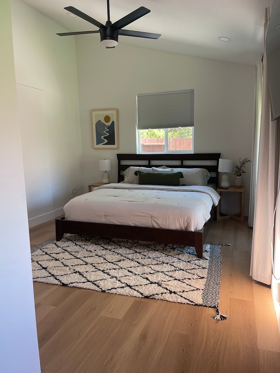King bed with wall mounted TV