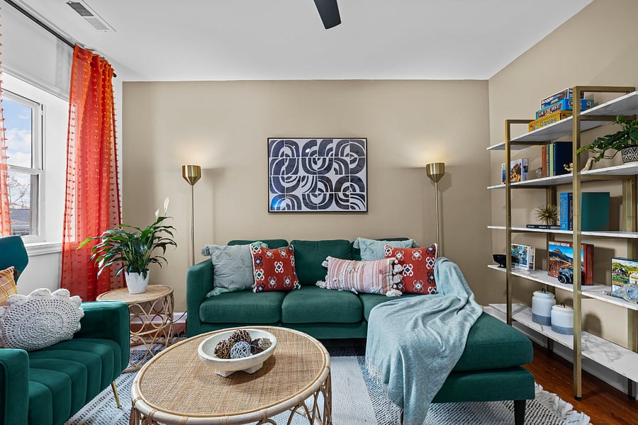L - shape Sofa and with matching velvet armchair welcomes our guest.