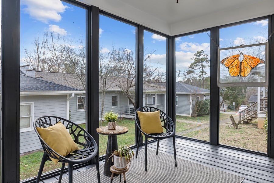 Welcoming your guest with our Large Screened Porch.
