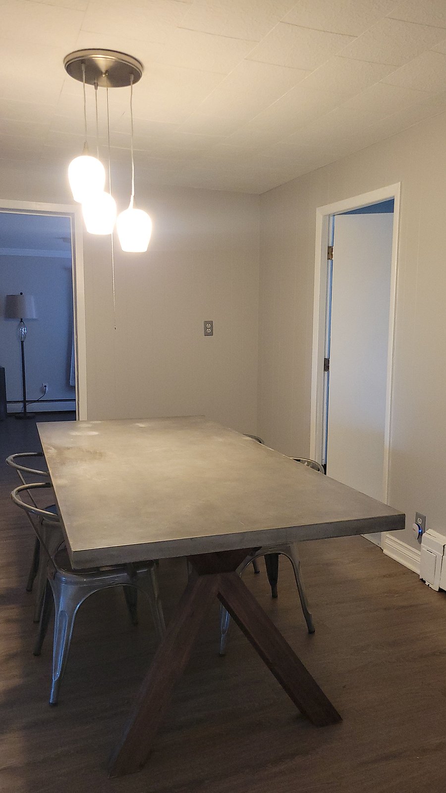 Dining Room with large concrete table