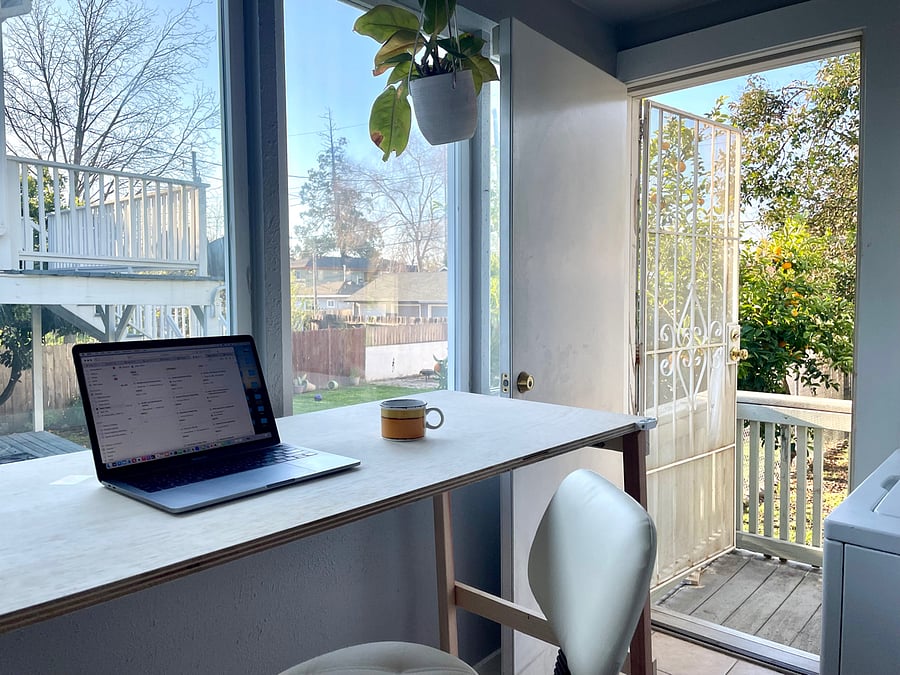 The laundry room doubles as a mini office. The natural light pours in during the morning sunrise.
