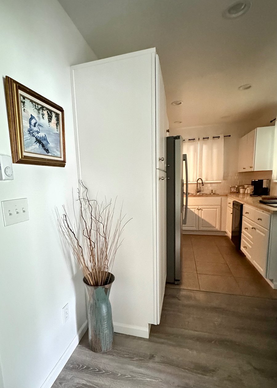 Looking into the Kitchen from back entry.