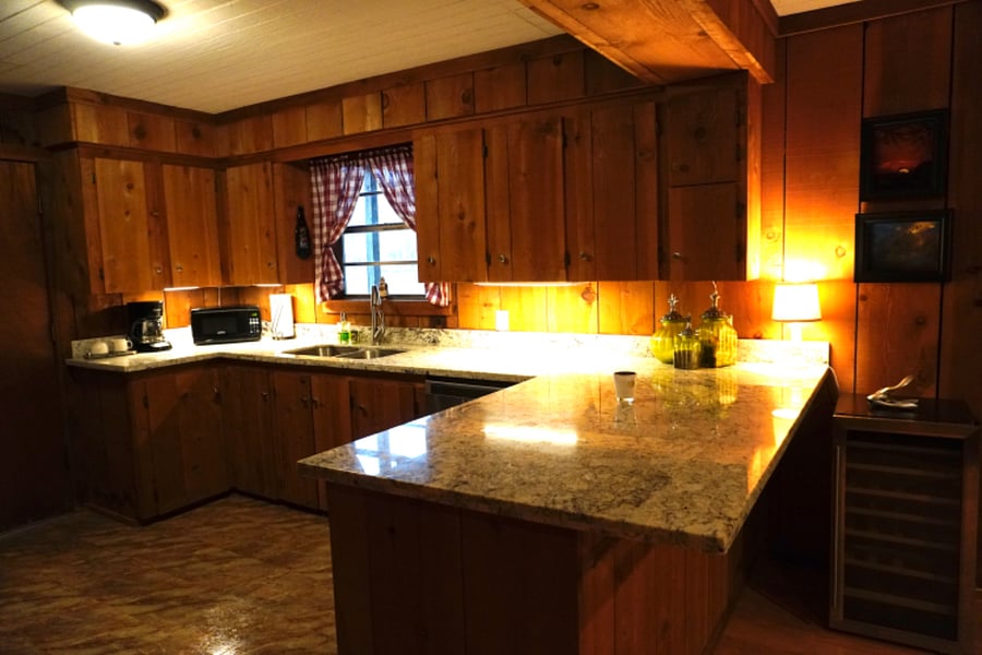 Fully furnished kitchen, including dishes, utensils, pots, pans, etc.
