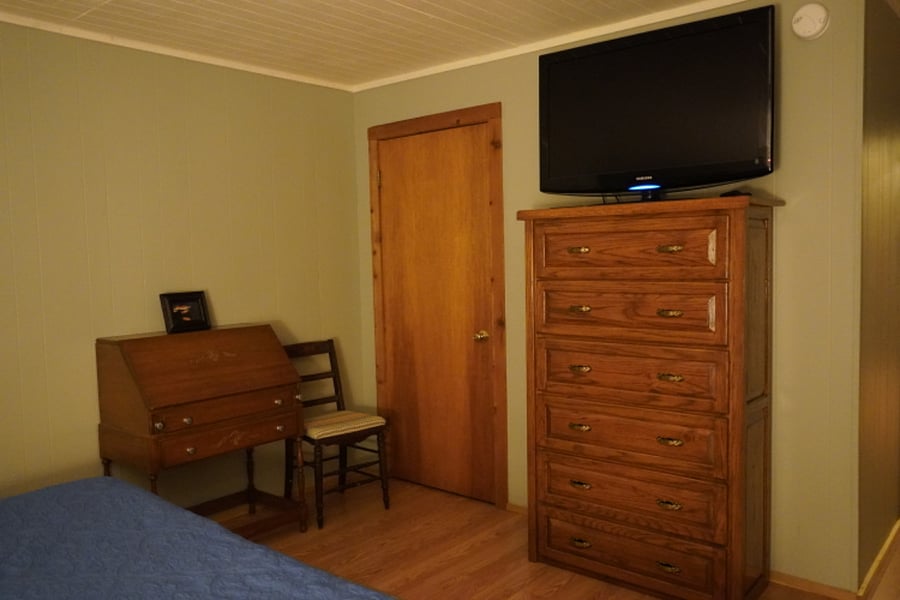 Master bedroom with flat screen tv