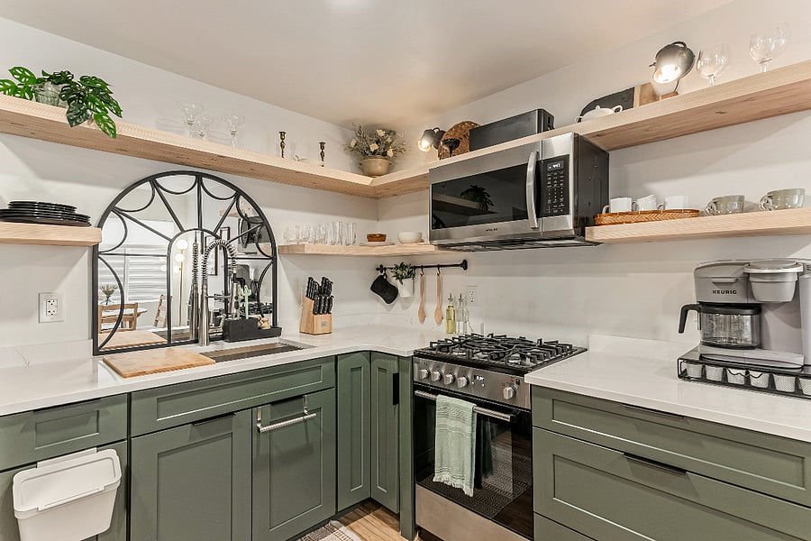 Kitchen - Stainless steel gas stove, oven, large microwave, and oversized kitchen sink. 